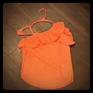 Orange one-sided cold shoulder top
